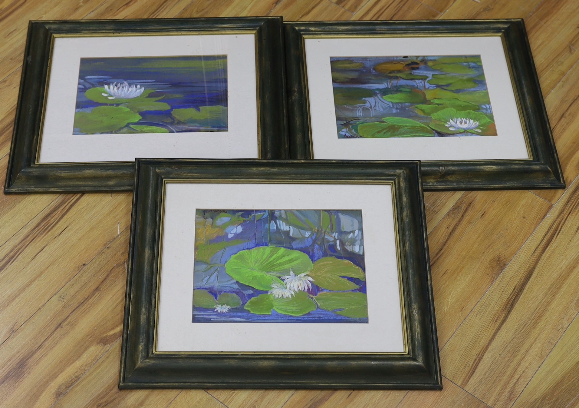 Madge Bright, three pastels, Waterlilies, signed, 24 x 34cm